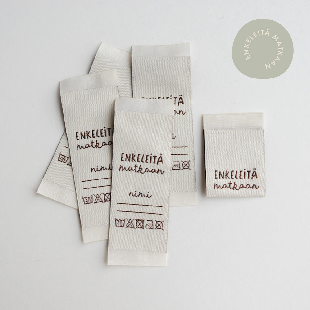Woven label - Enkeleitä matkaan