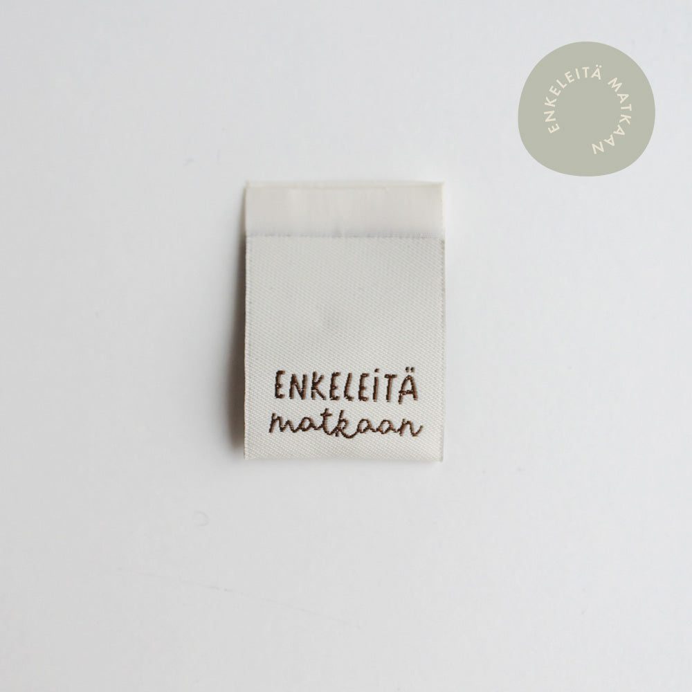 Woven label - Enkeleitä matkaan